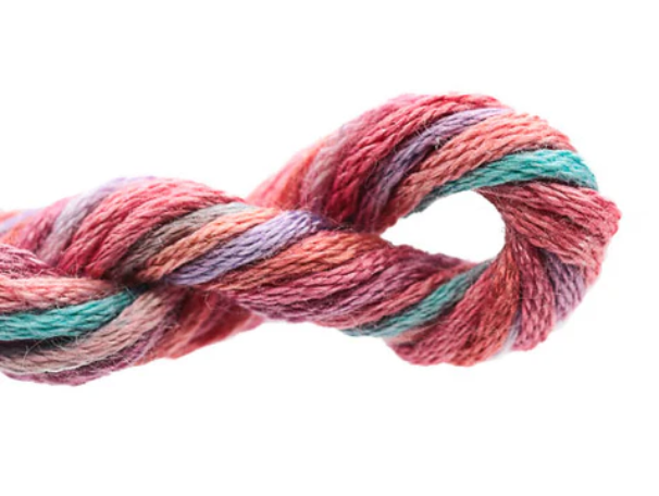 Multicolored rope knot on a white background