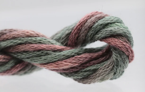 Multicolored yarn skein on a white background