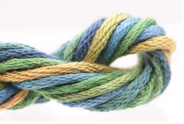 Multicolored yarn skein on a white background