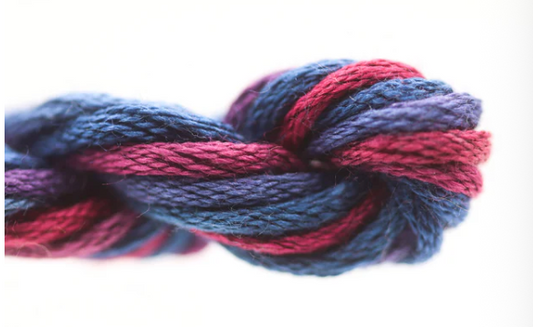 Braided yarn with red and blue colors on a white background