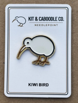 Kiwi bird needlepoint kit on a white card with 'Kit & Caboodle Co.' branding.