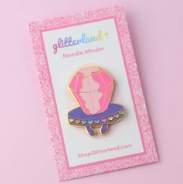 Pin on a pink card with 'glittergalore' branding on a pink background