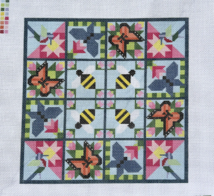Cross-stitched pattern with butterflies and bees on a grid background
