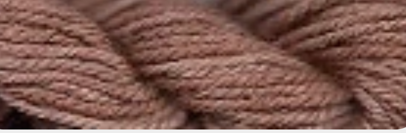 A close-up of a twisted yarn or thread in a warm taupe-brown color, filling the frame.