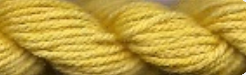 A close-up of twisted yellow yarn
