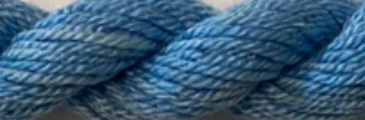 A close-up of a twisted blue yarn or cord texture filling the frame.