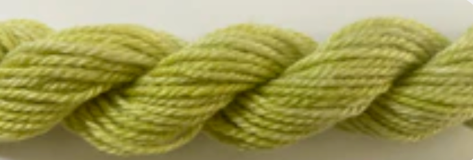 A close-up of a twisted yarn or cord in a pale yellow-green color.