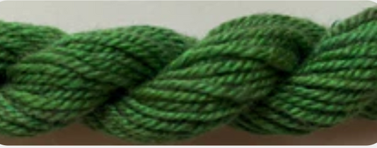 A close-up of a thick, twisted green rope or yarn texture against a plain.