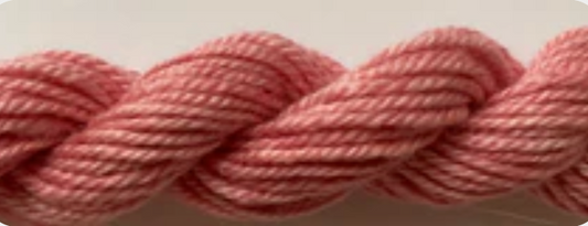 A close-up of a pink twisted yarn or cord texture.