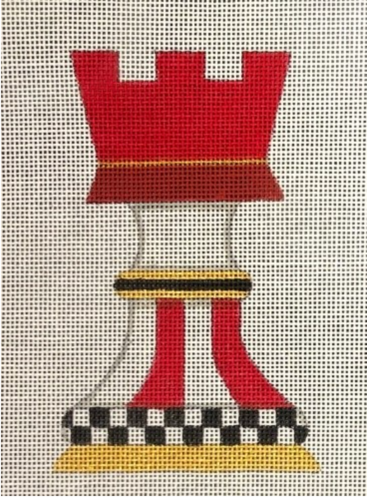 Red chess rook with checkered base on needlepoint canvas