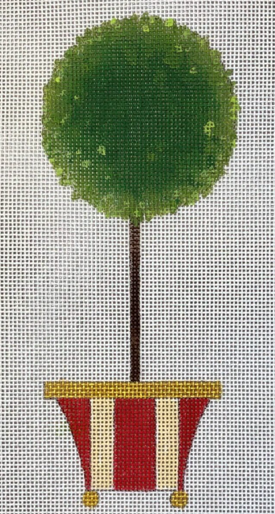 Green topiary tree with red and cream striped pot and gold trim