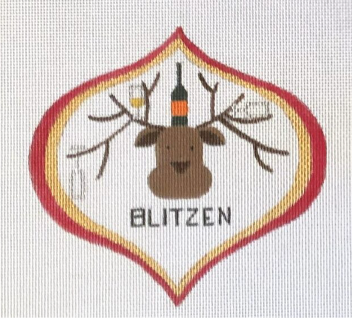 A reindeer needlepoint patch with BLITZEN lettering and bottle
