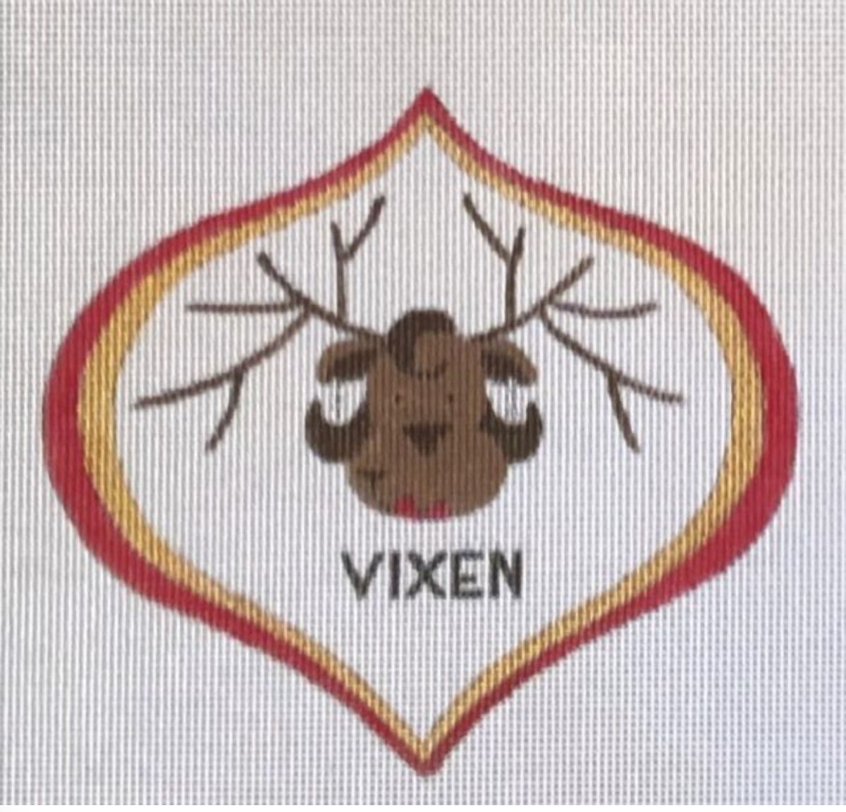 A reindeer needlepoint patch with VIXEN lettering and gold border