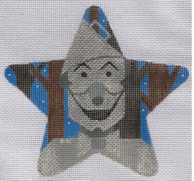 A star-shaped needlepoint canvas with a smiling winter face