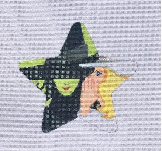 Witch and yellow-haired figure on a star-shaped needlepoint canvas.