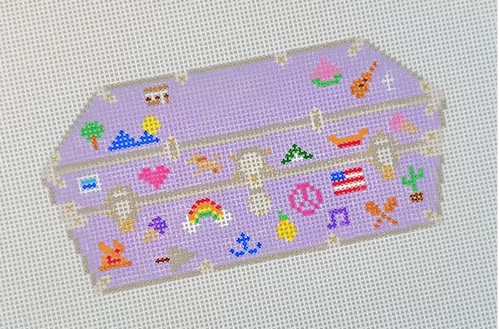 Lavender coffin-shaped needlepoint design with colorful symbols