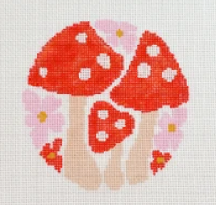 Three red mushrooms with white spots and pink flowers