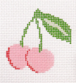 Pink cherries with green stems and leaves
