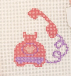 Pink telephone with purple cord and heart