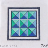 Quilt pattern with green and blue triangles in a square frame, brand 'Zoe' visible.