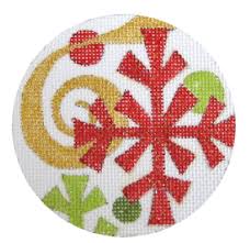 Round fabric patch with red snowflake design on a white background