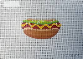 Hot dog needlepoint design on a light gray background