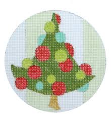 Circular patch with a Christmas tree design featuring green, red, and blue colors on a white background.