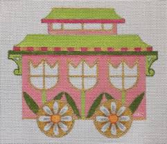 Colorful vintage floral carriage with tulips and ornate wheels
